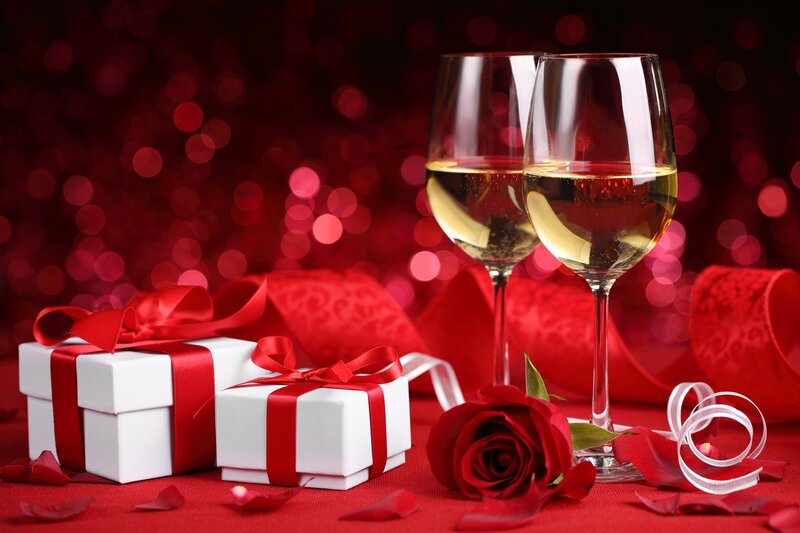 Two Wine Glasses and Gifts