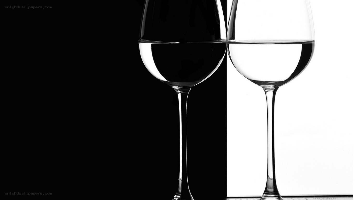 Two wine glasses in contrast