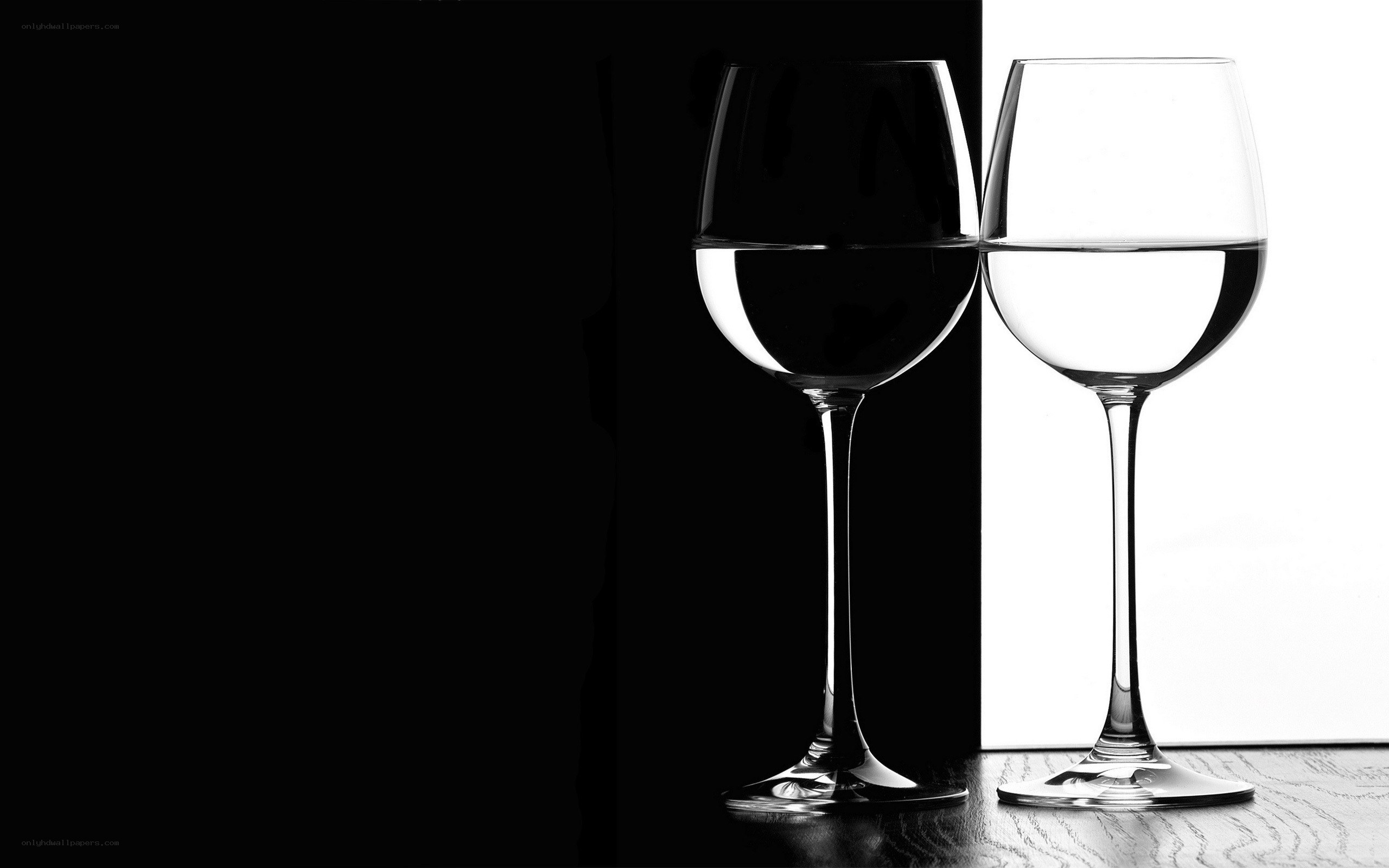 Two wine glasses in contrast