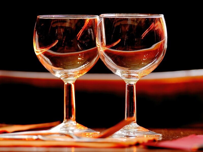 Two wine glasses on a table