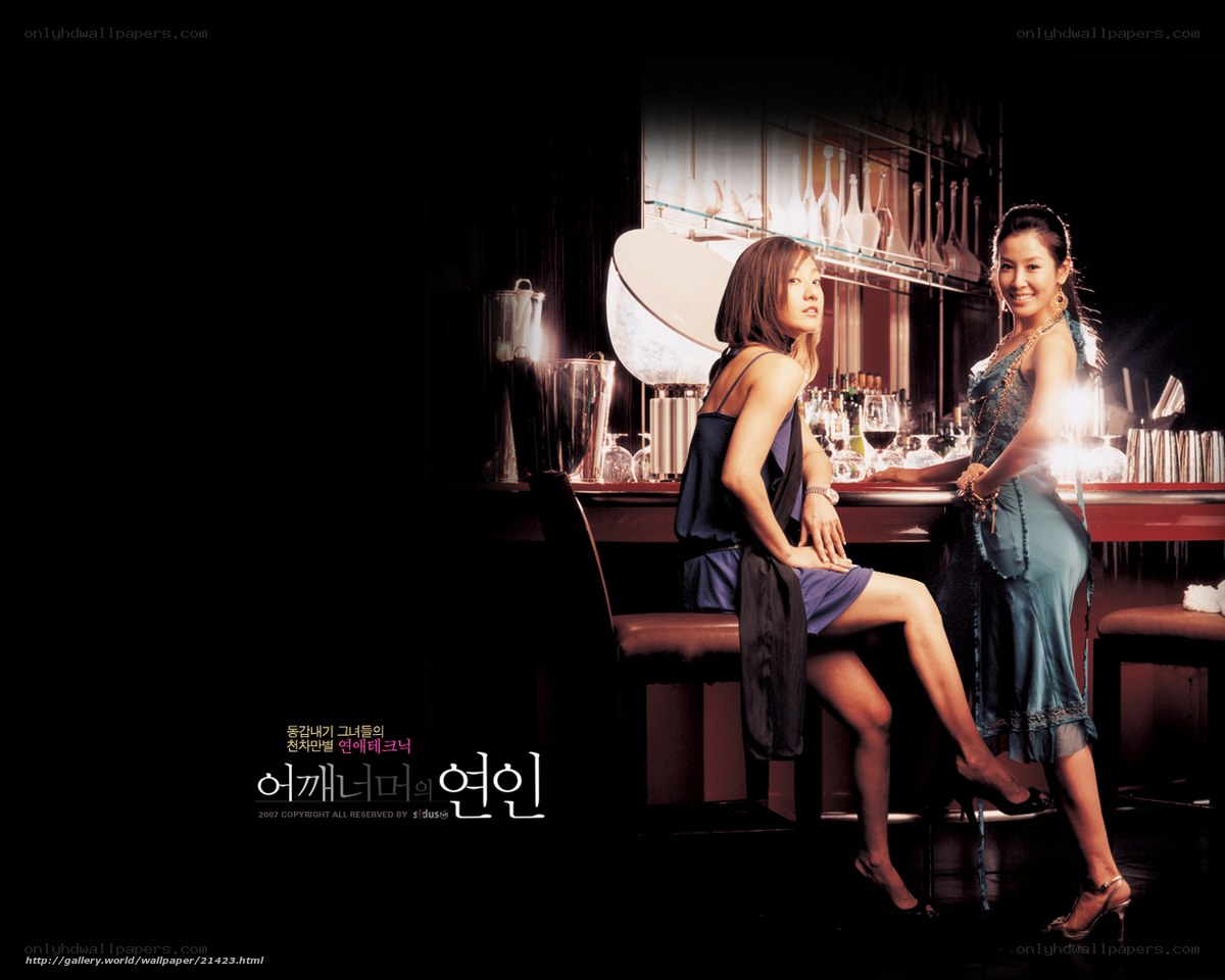 Two women at a bar