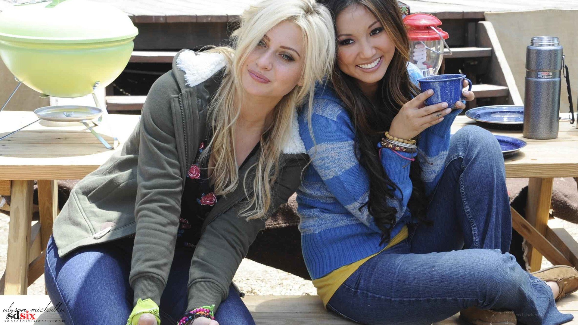 Two women at a campsite
