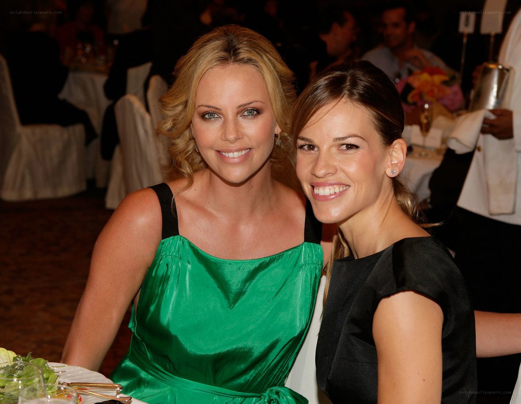 Two women at a formal dinner