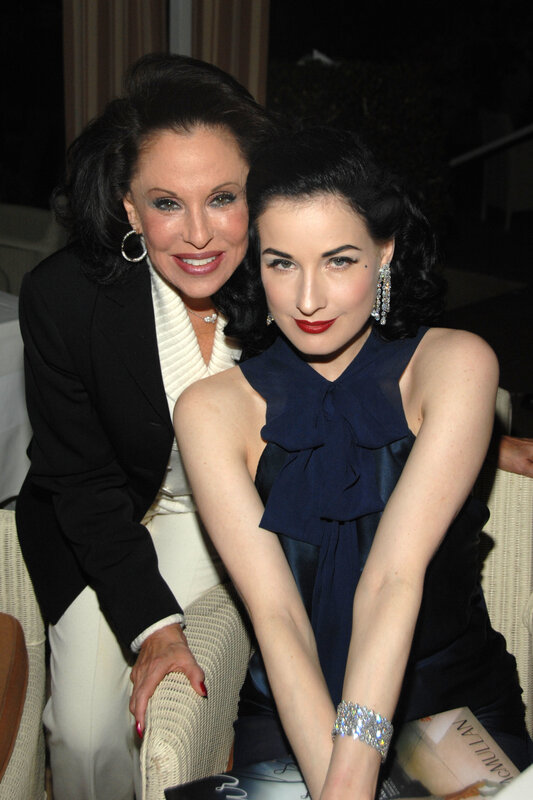Two women at a formal event