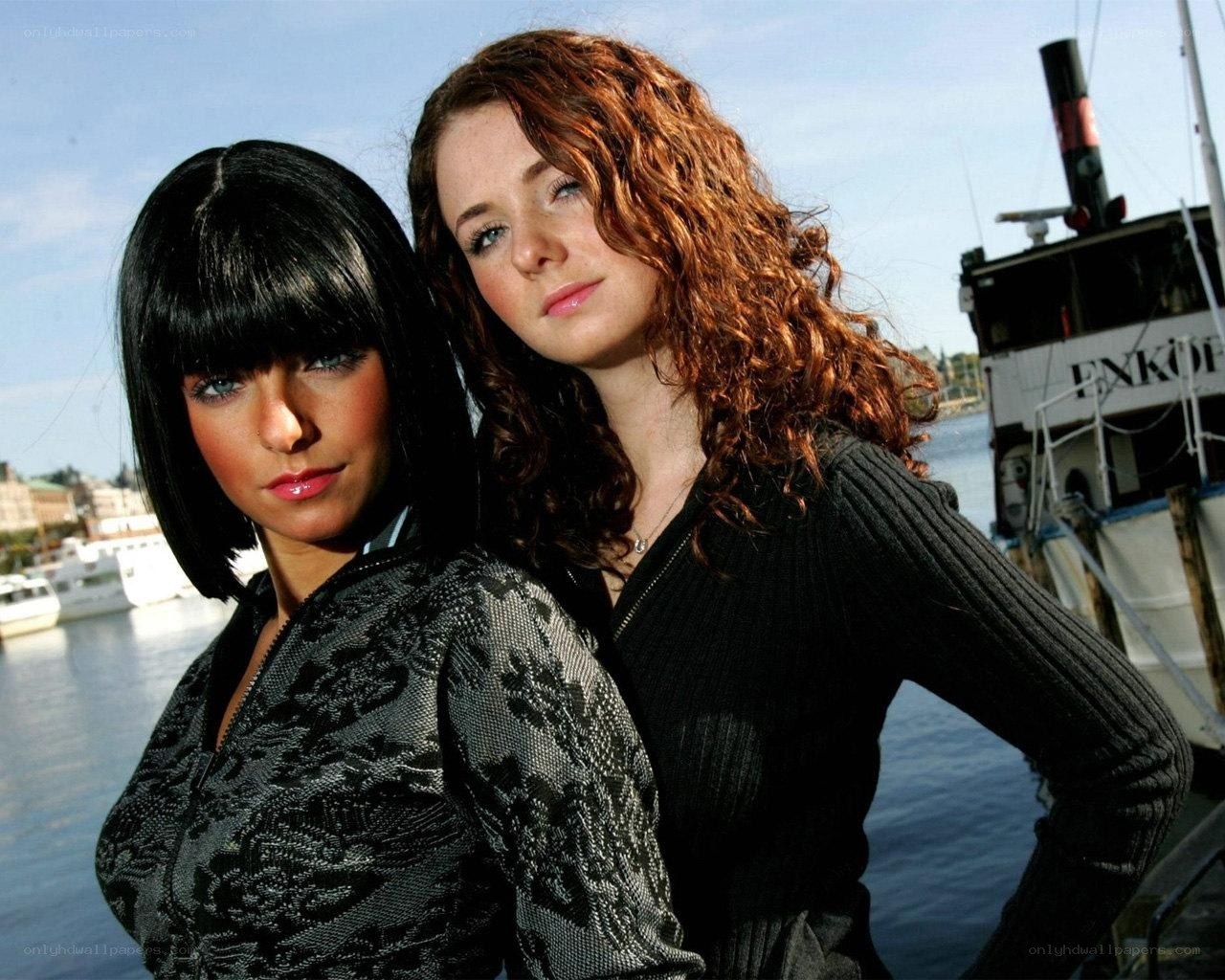 Two women at a harbor