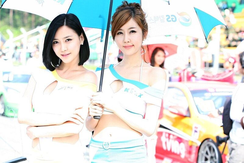 Two women at a motorsport event