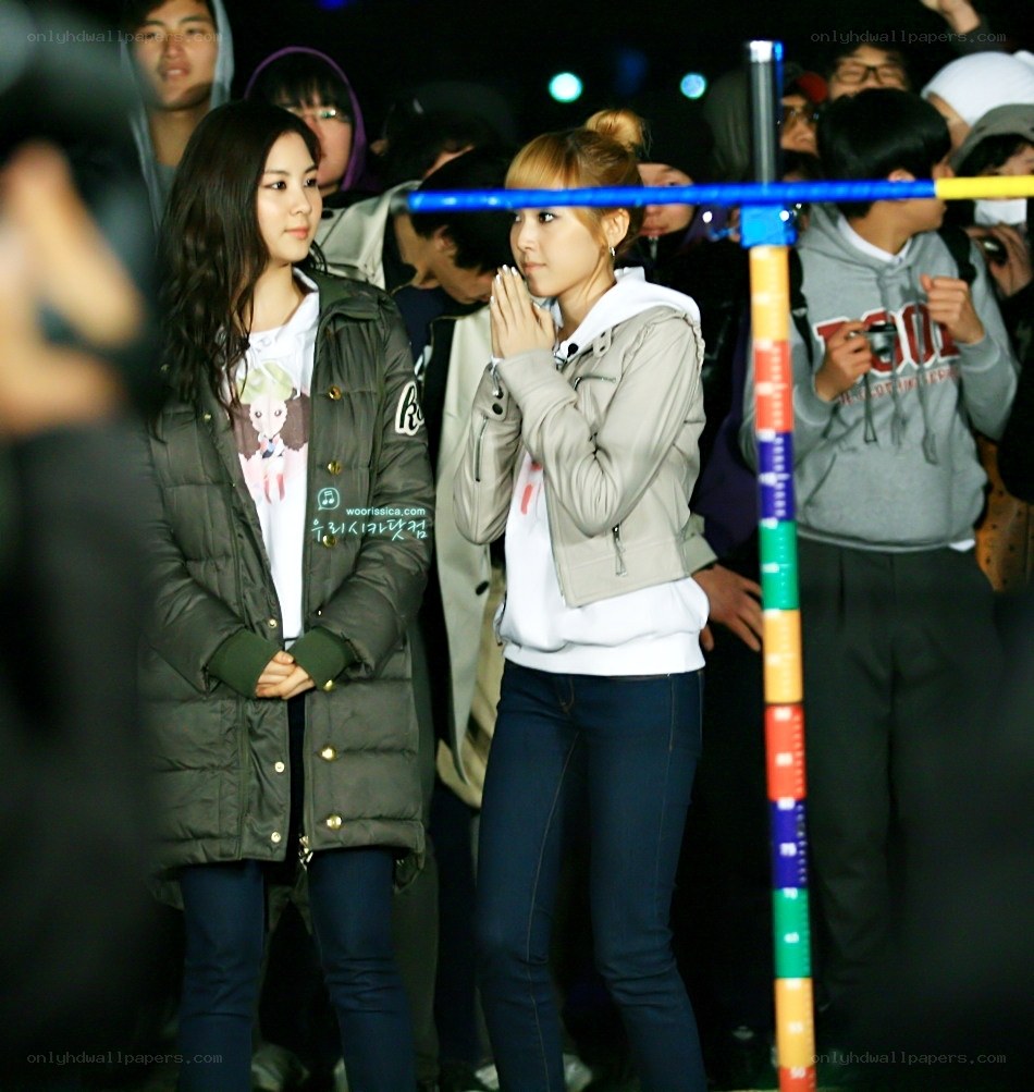 Two women at a nighttime event