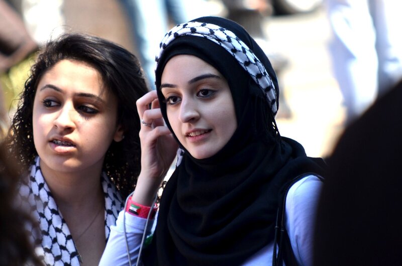 Two women at a public gathering