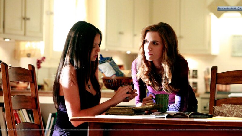 Two Women at a Table — Brown, Serious