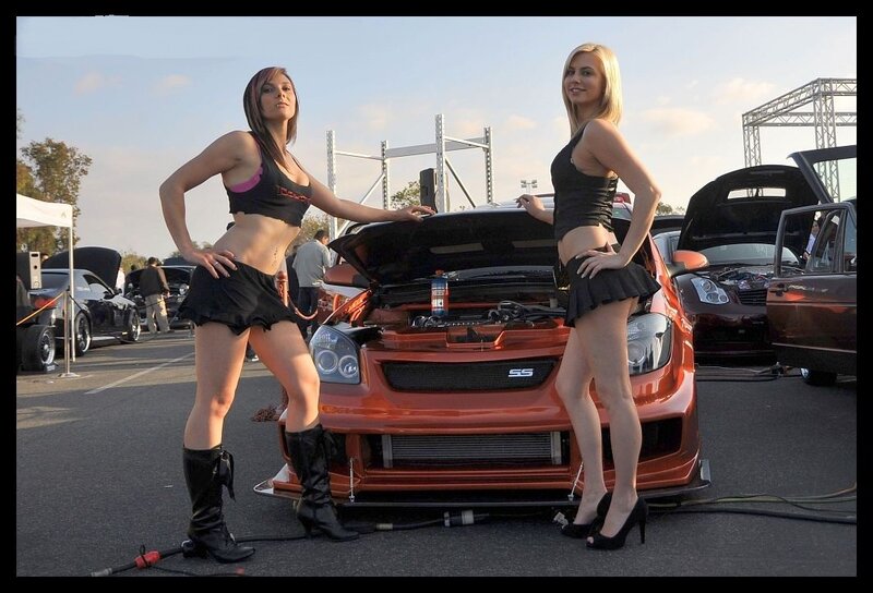 Two Women at Car Show — Orange