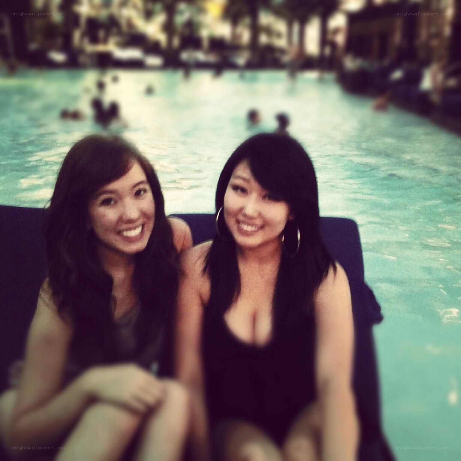 two women at poolside