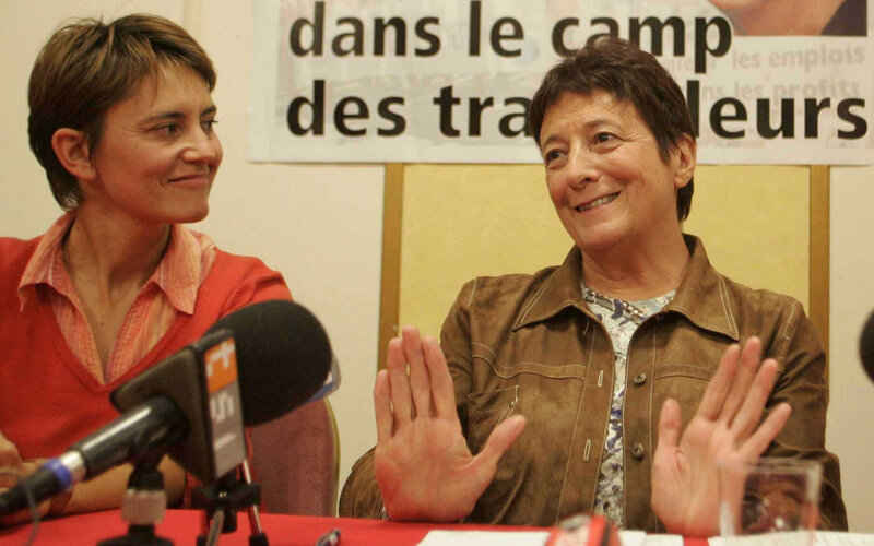 two women at press conference