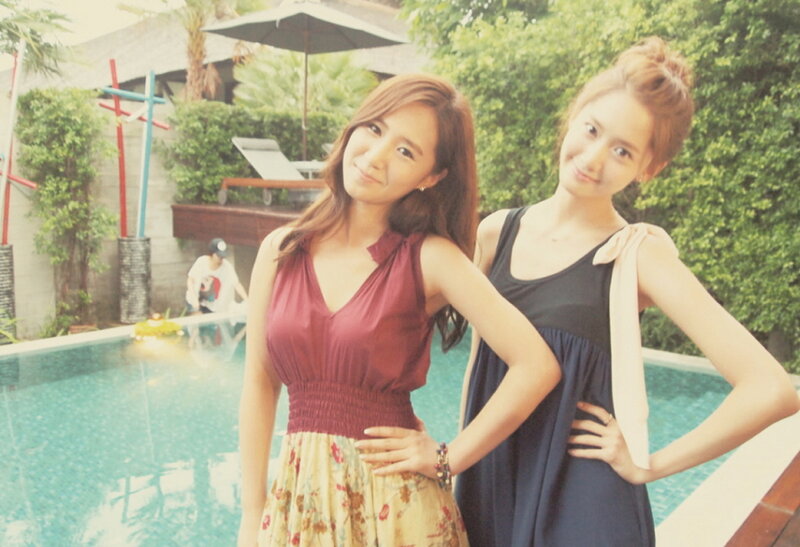Two women by a pool