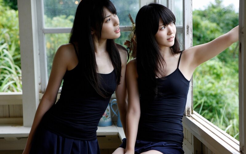 two women by a window