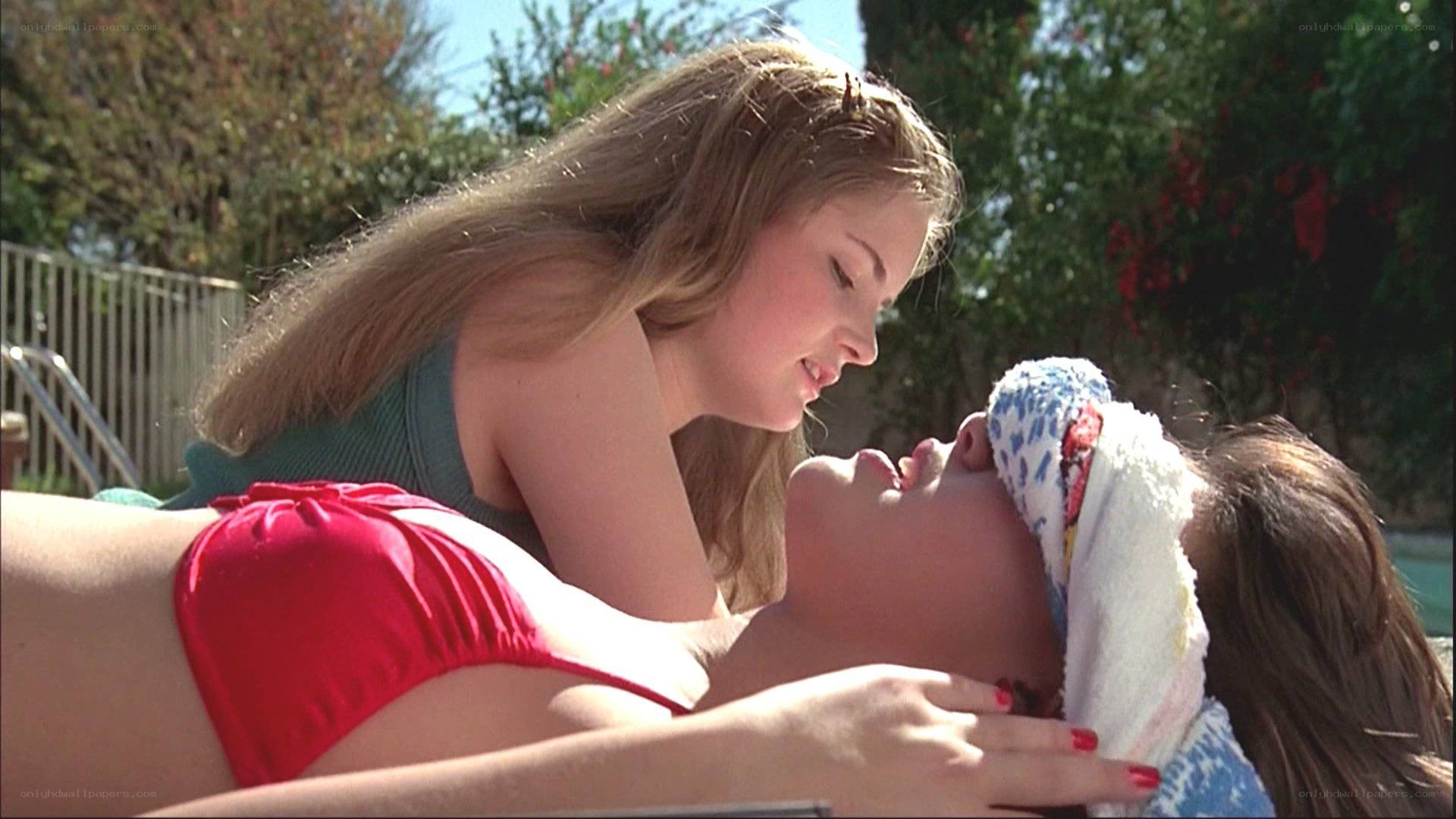 Two women by the pool