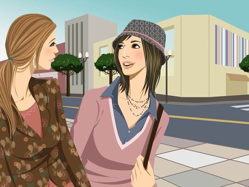 Two women chatting on a city street
