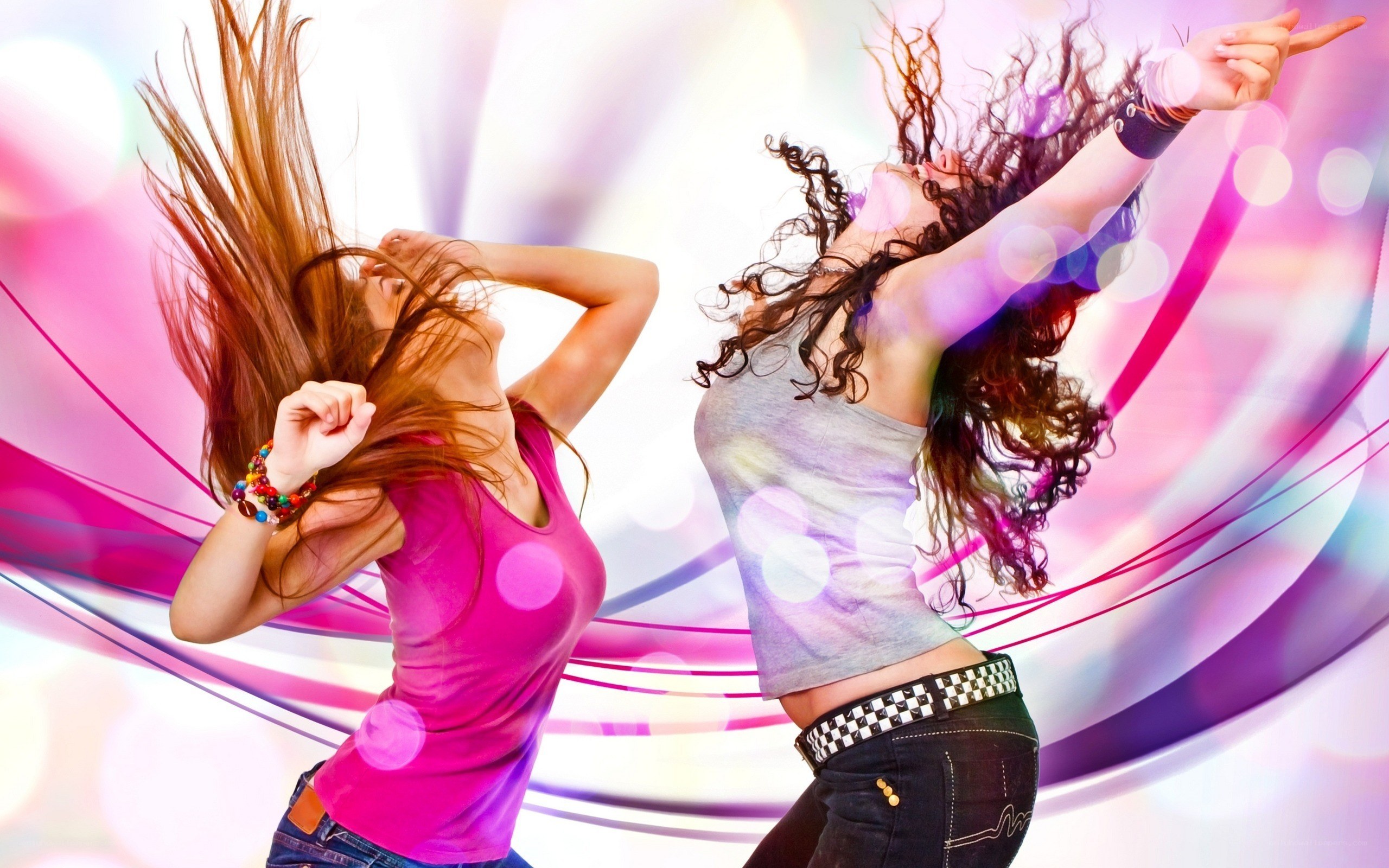 Two women dancing energetically