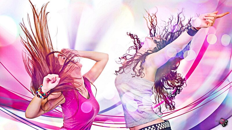 two women dancing energetically