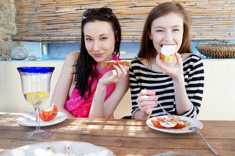 Two women eating outdoors