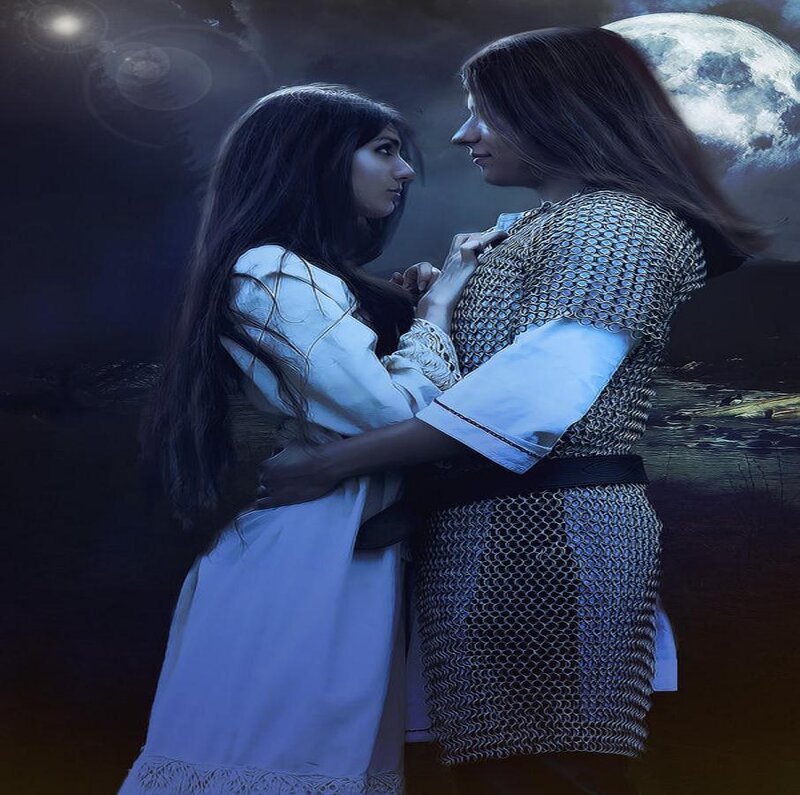Two women embrace under the moon