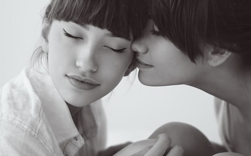 Two Women Embracing — Black, Intimate, Photograph