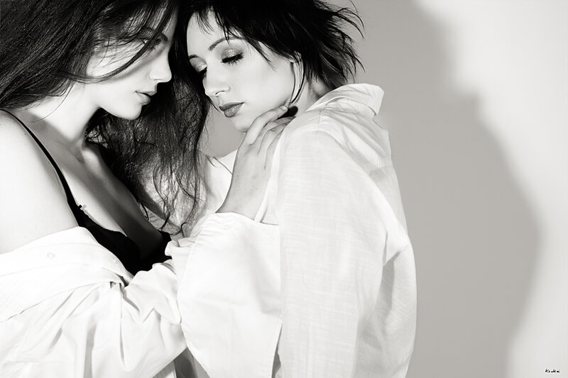 Two Women Embracing — Black, Intimate