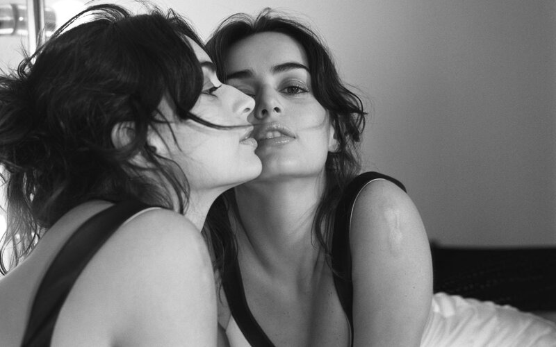 Two Women Embracing — Black