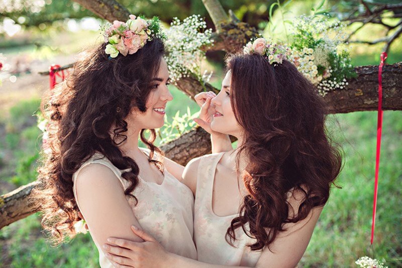 Two Women Embracing — Green, Intimate, Afternoon