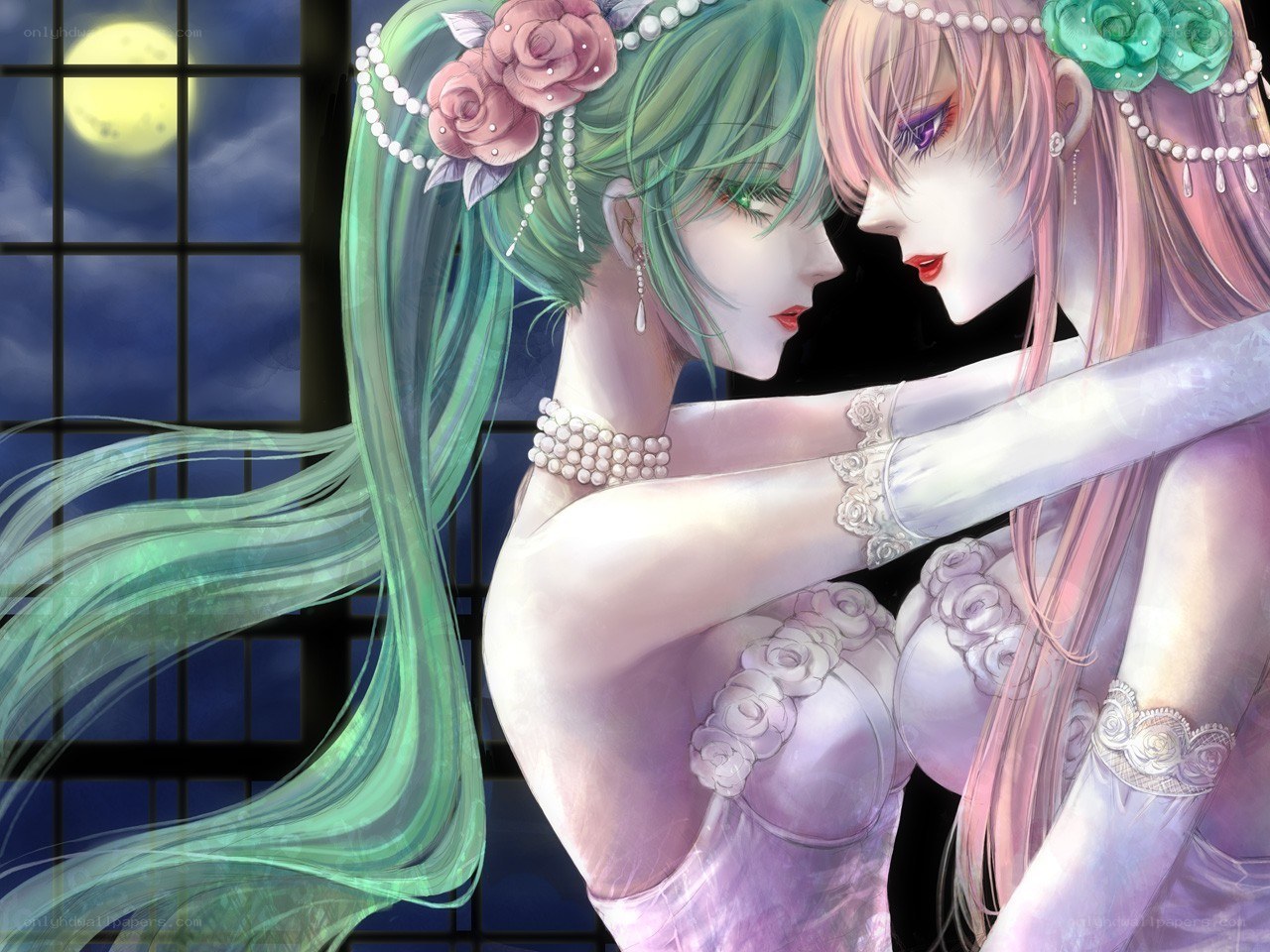 Two women embracing under moonlight