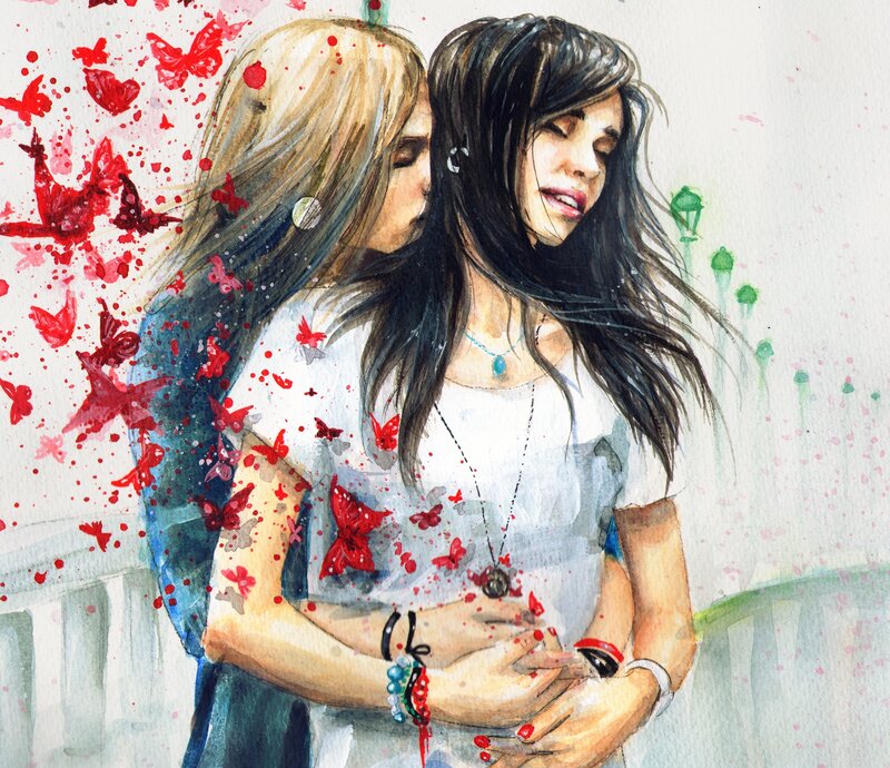 Two women embracing with red butterflies