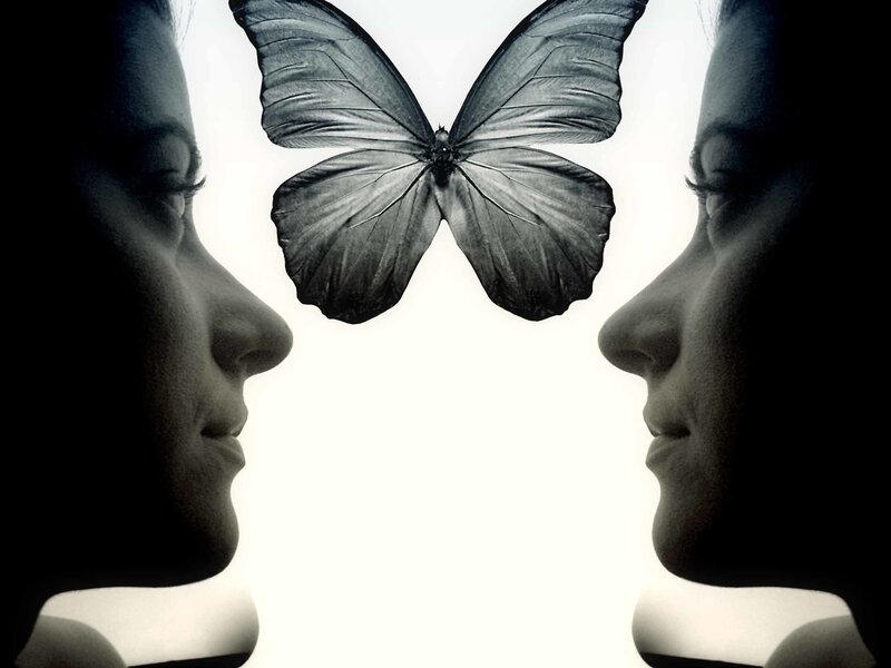 Two Women Facing Butterfly