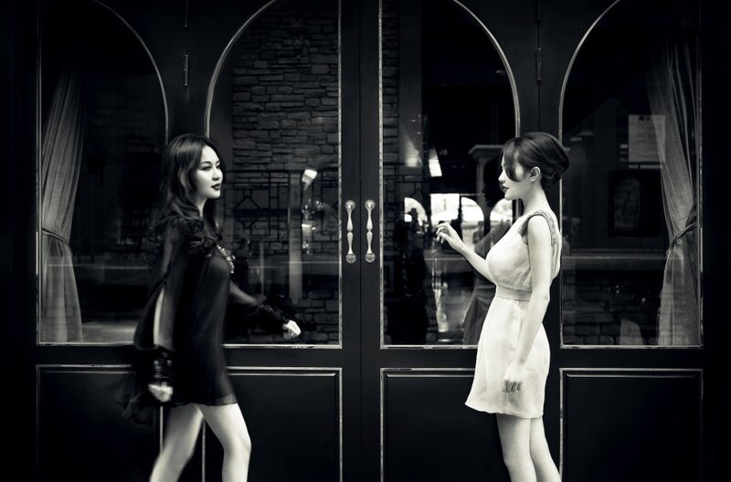 Two Women Facing Each Other — Black, Dramatic, Night, Photograph