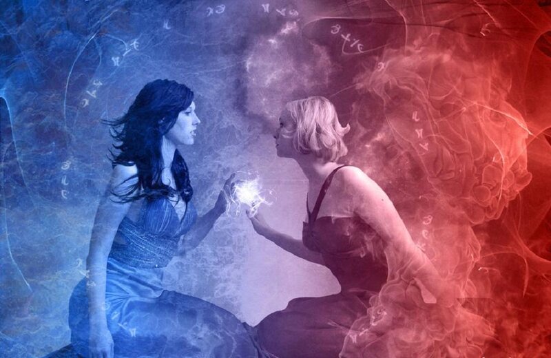 Two Women Facing Each Other — Blue, Dramatic