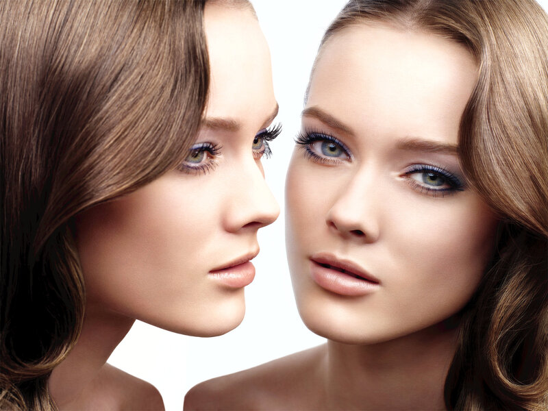 Two Women Facing Each Other — Brown
