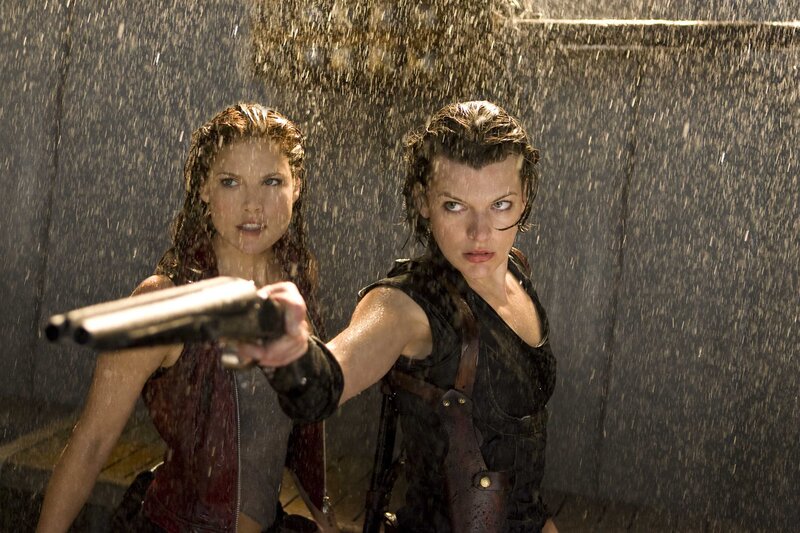 Two Women Holding Guns — Black, Tense, Dramatic
