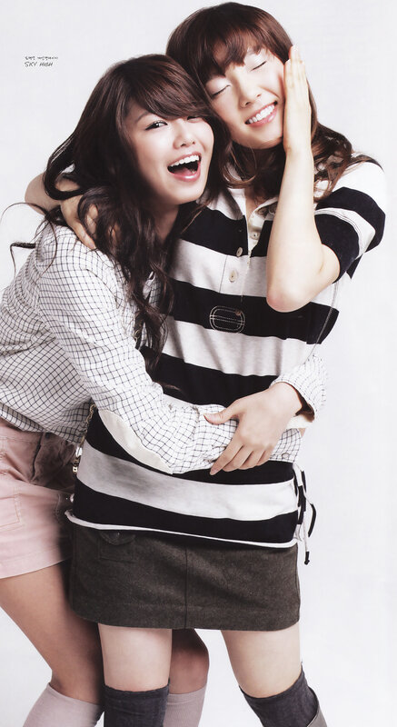 two women hugging and smiling