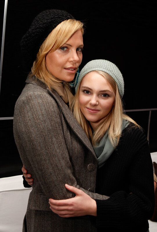 Two women hugging at an event