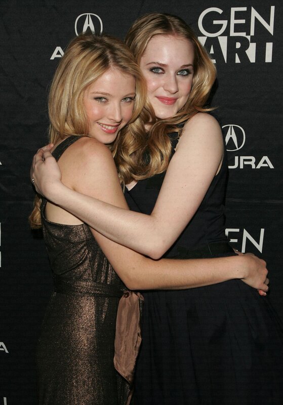 Two women hugging at event