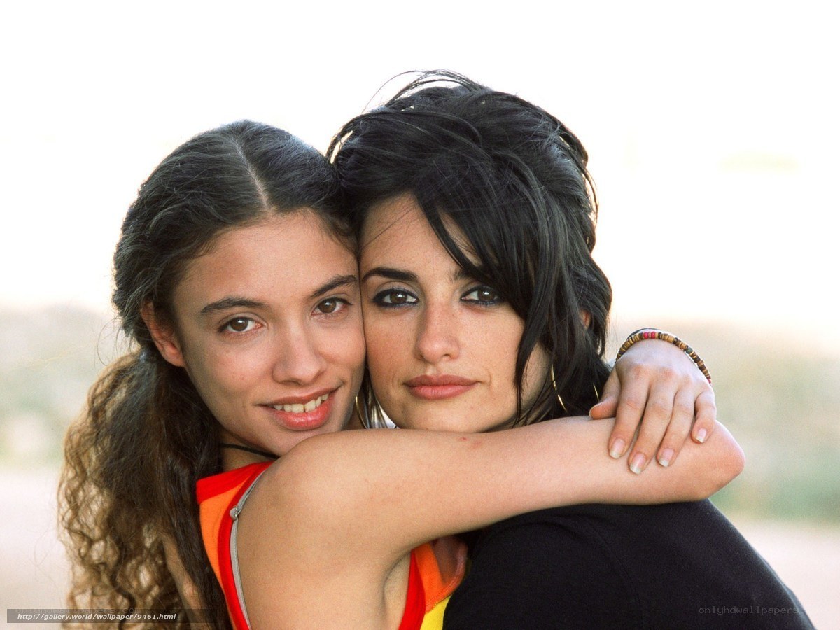 two women hugging outdoors