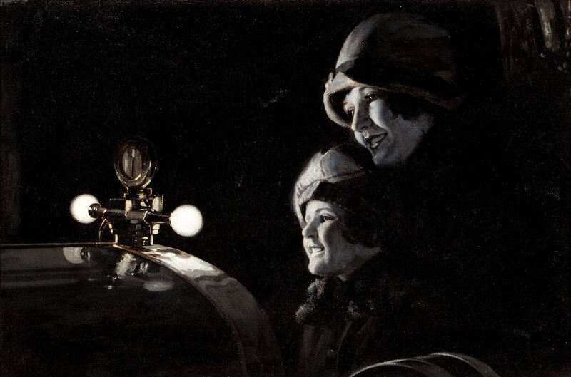 Two women in a car at night