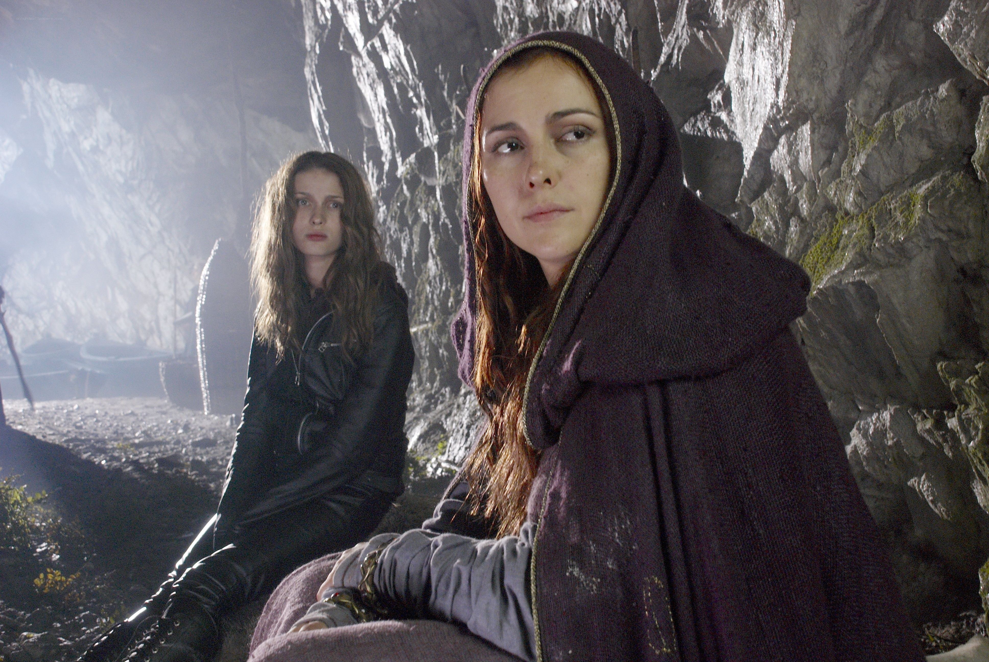 Two women in a cave
