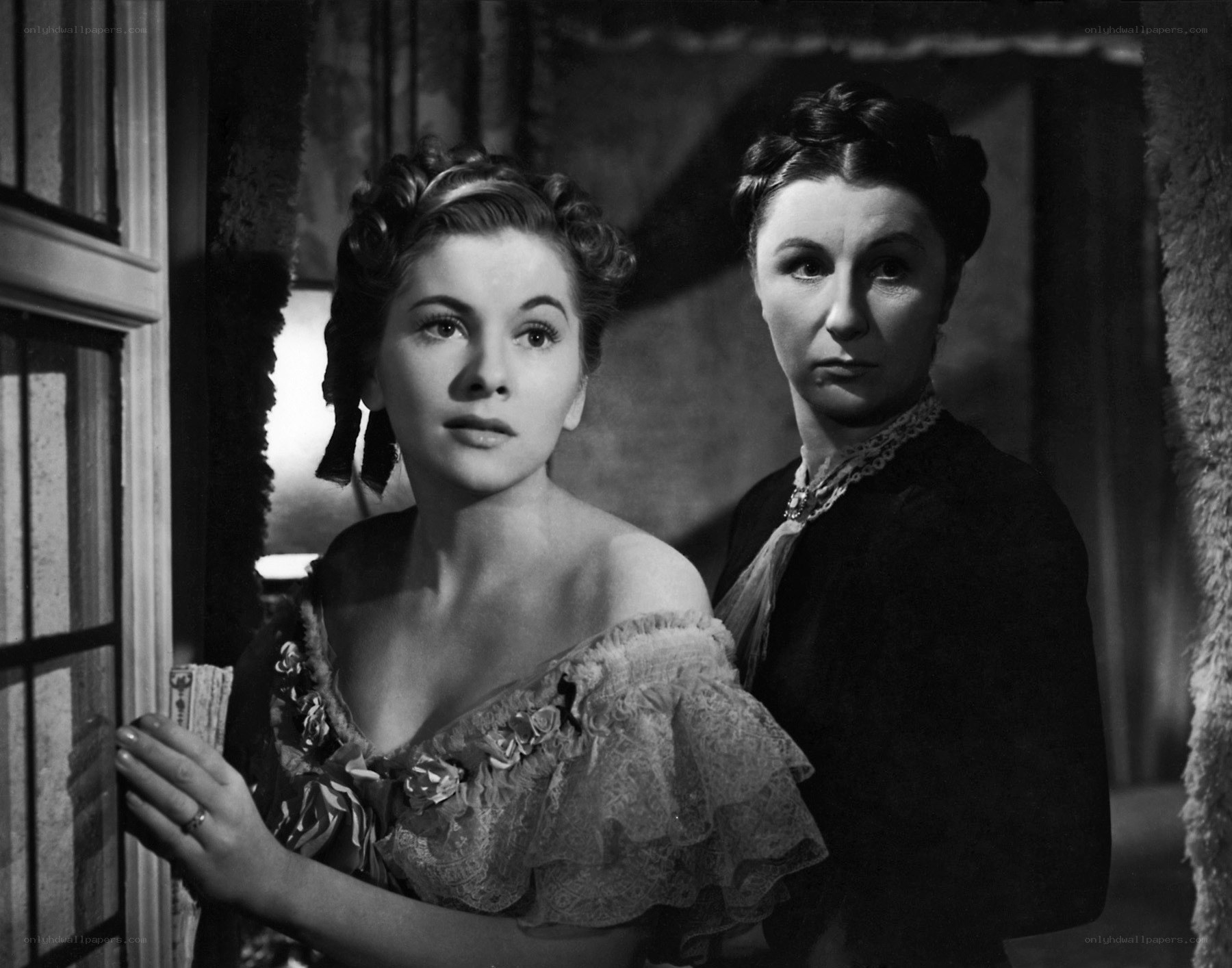 Two women in a dramatic scene