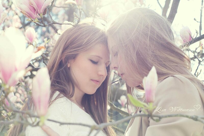 Two women in a flower garden
