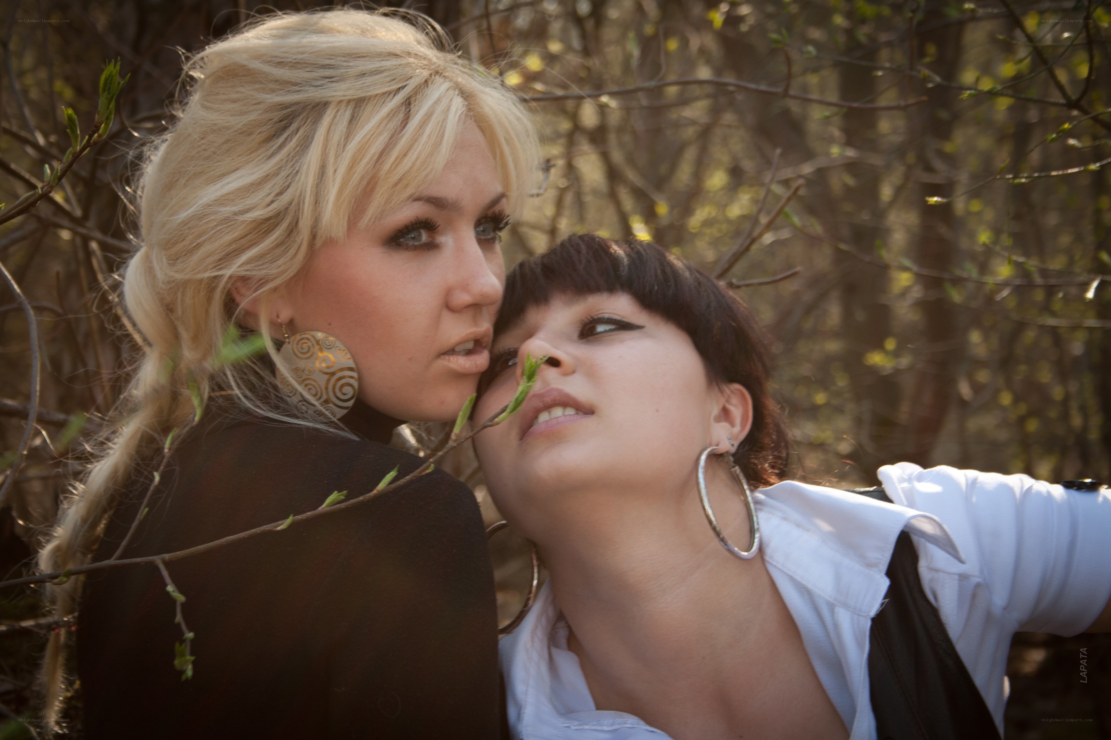 Two women in a forest