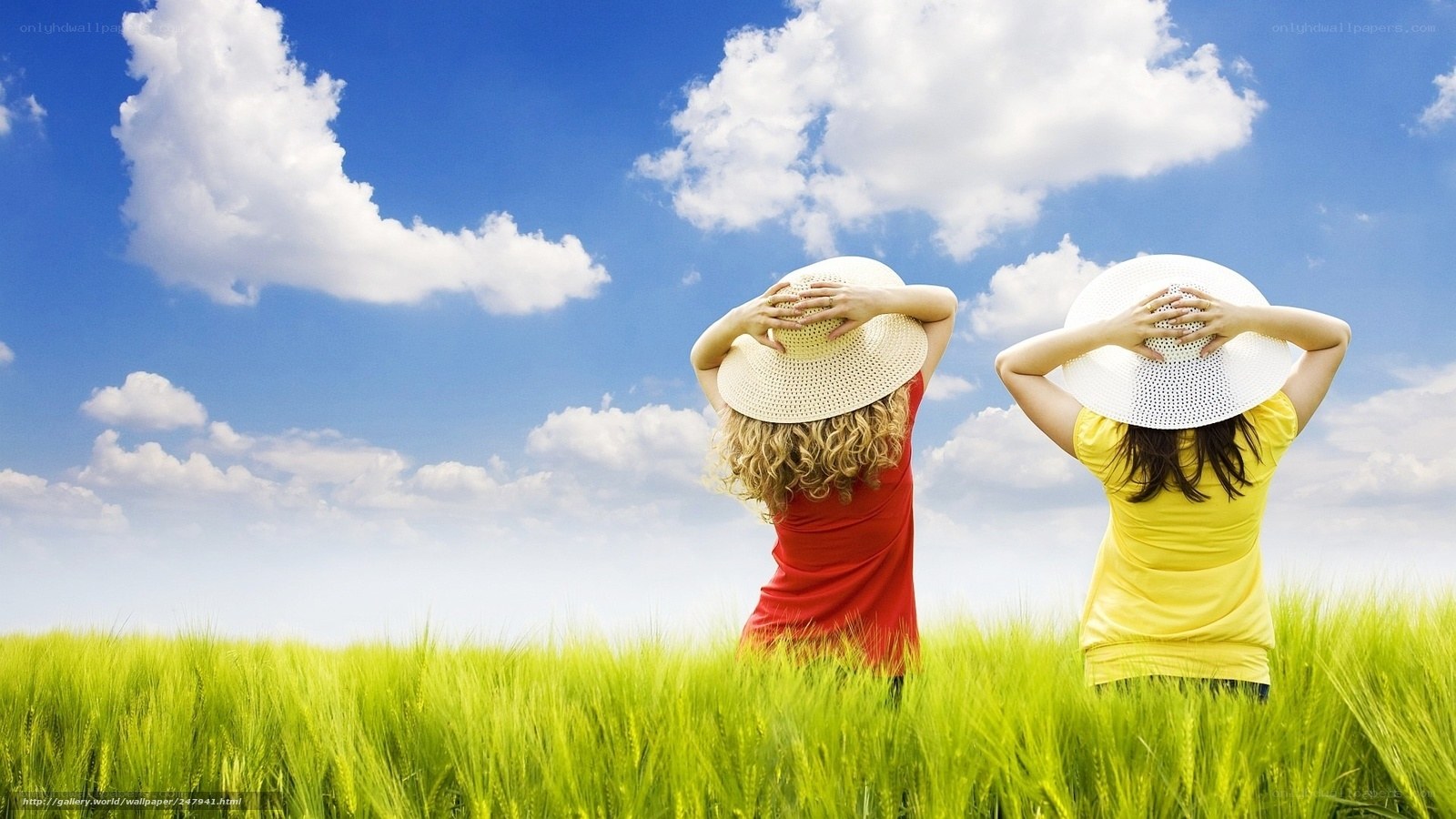 Two women in a green field