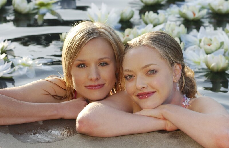 Two women in a lily pond
