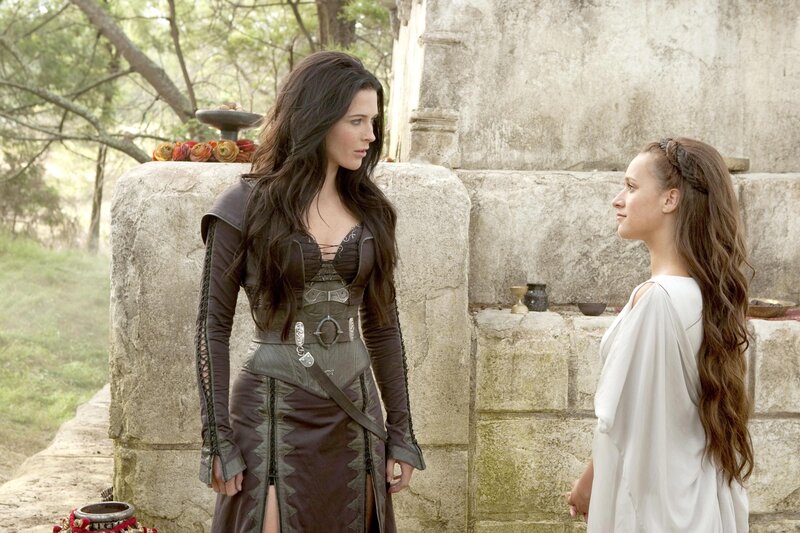 Two women in a stone courtyard