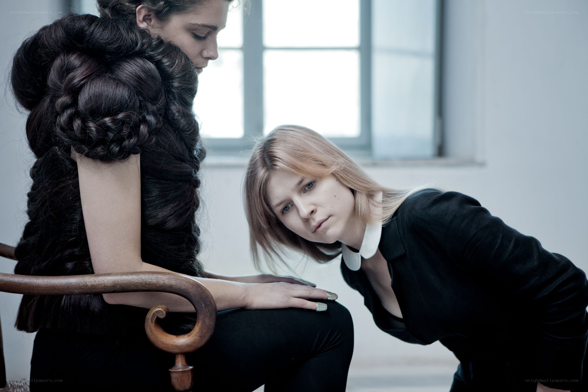 Two women in a studio setting