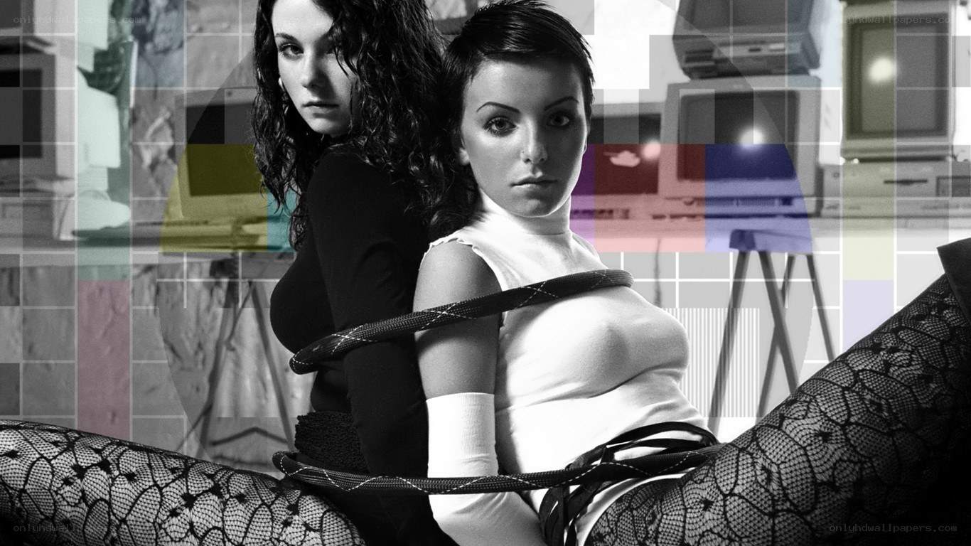 two women in a tech-themed setting
