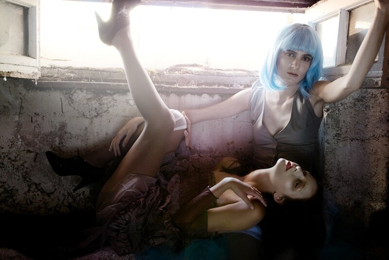 Two women in an abandoned room